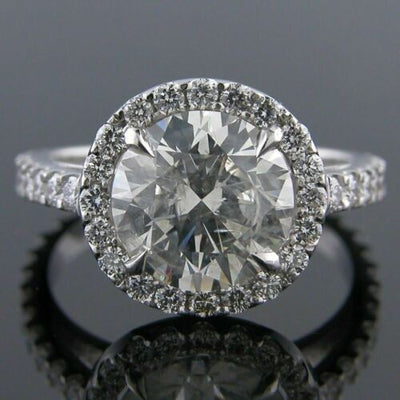 Magnificent 4.82 Carat Round Cut Diamond Halo Engagement Ring F/SI1